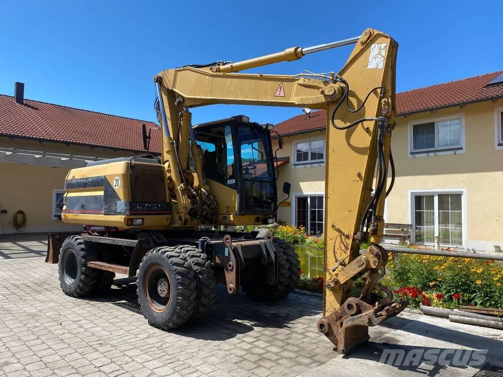 CAT M 312 Колёсные экскаваторы