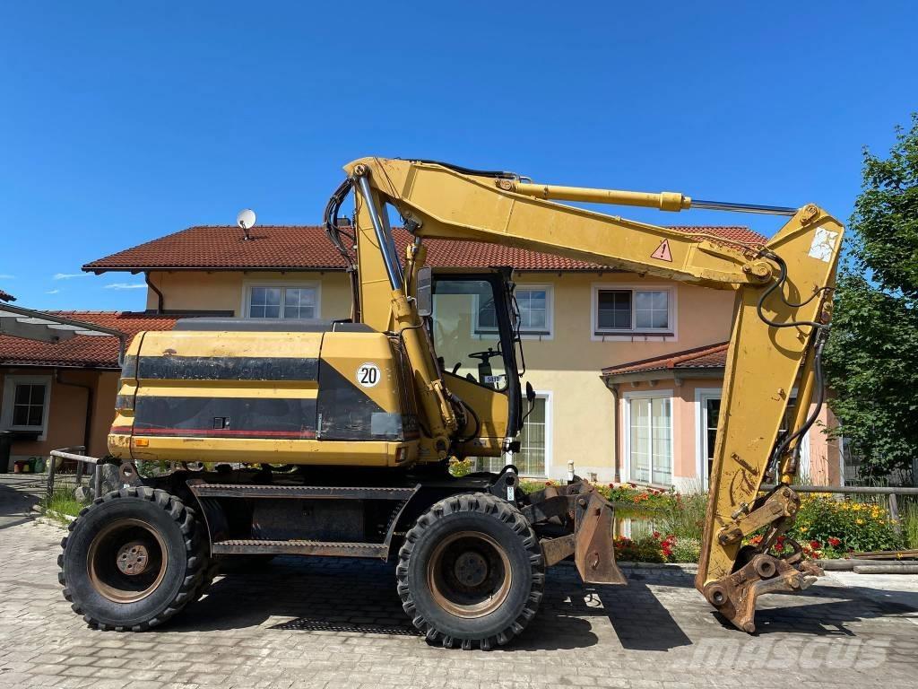 CAT M 312 Колёсные экскаваторы