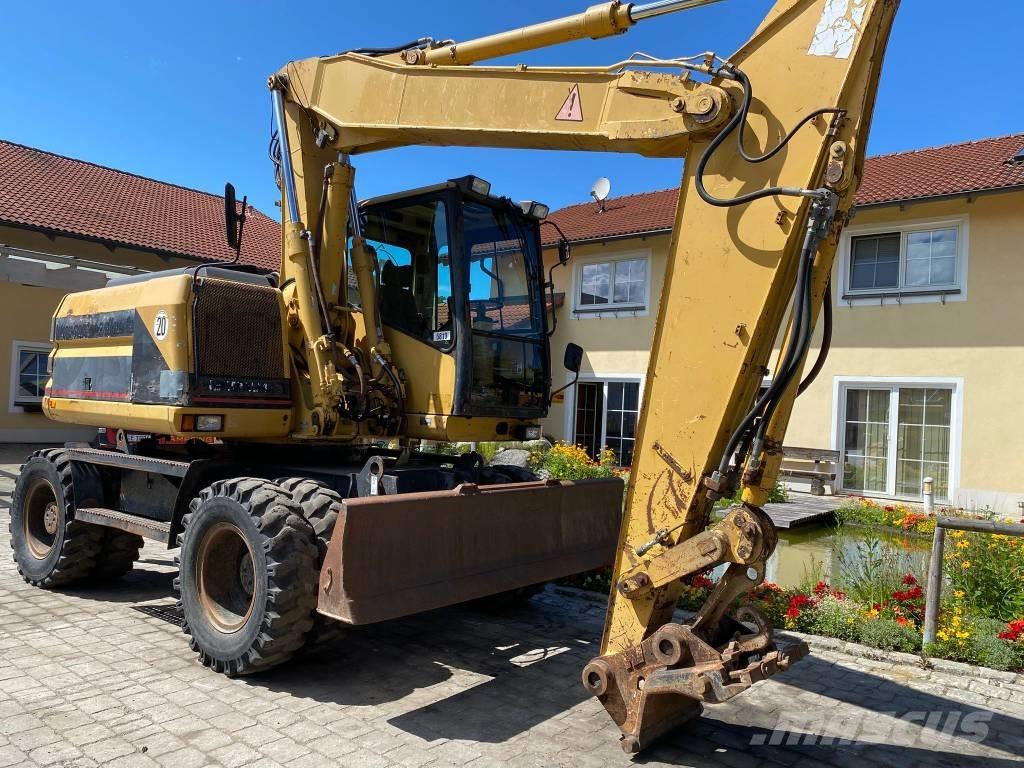 CAT M 312 Колёсные экскаваторы