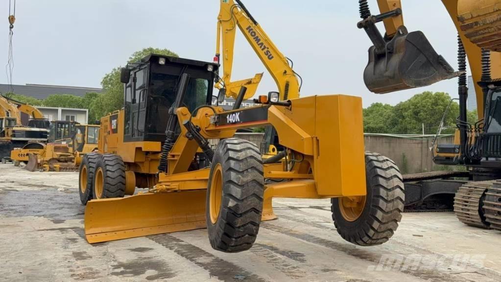 CAT 140K Грейдеры