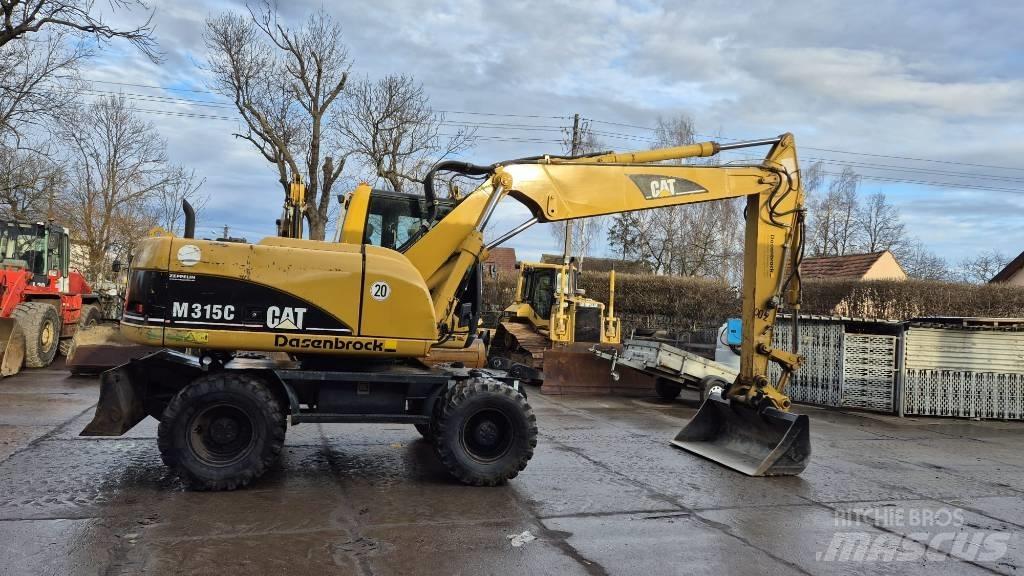 CAT M 315 C Колёсные экскаваторы
