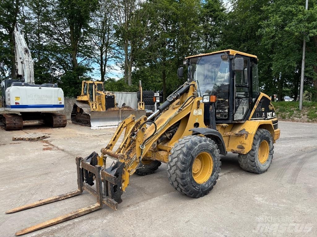 CAT 908 Фронтальные погрузчики