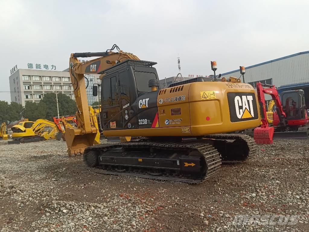 CAT 323 D2L Гусеничные экскаваторы