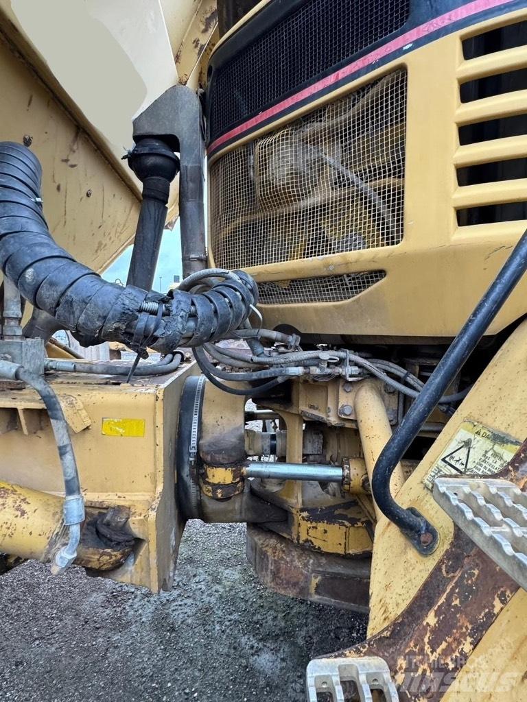 CAT 730 Шарнирно-сочленённые самосвалы