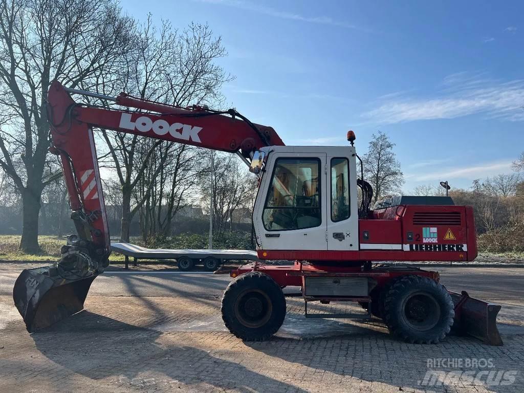 Liebherr 902 Колёсные экскаваторы
