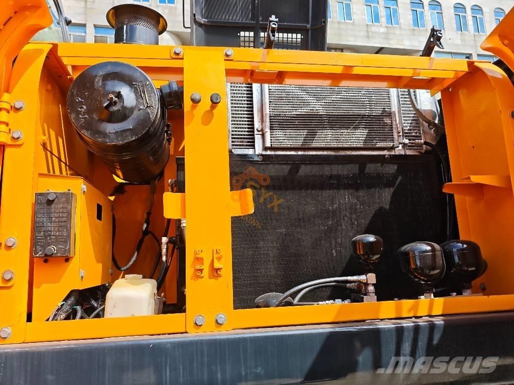 Hyundai 210W-9 Колёсные экскаваторы