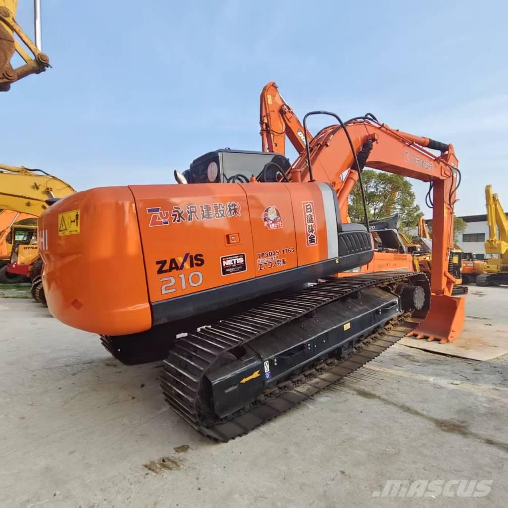 Hitachi ZX 210 Гусеничные экскаваторы