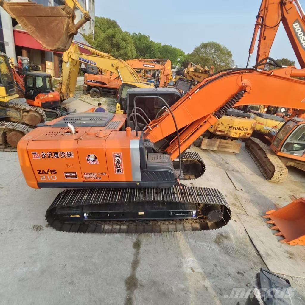 Hitachi ZX 210 Гусеничные экскаваторы