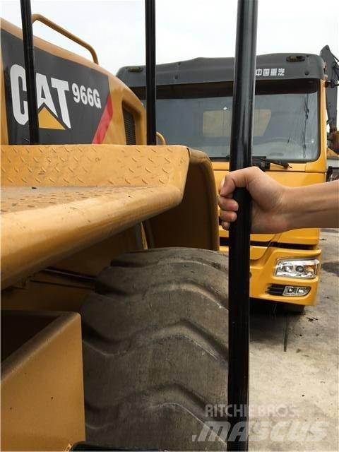 CAT 966G Фронтальные погрузчики