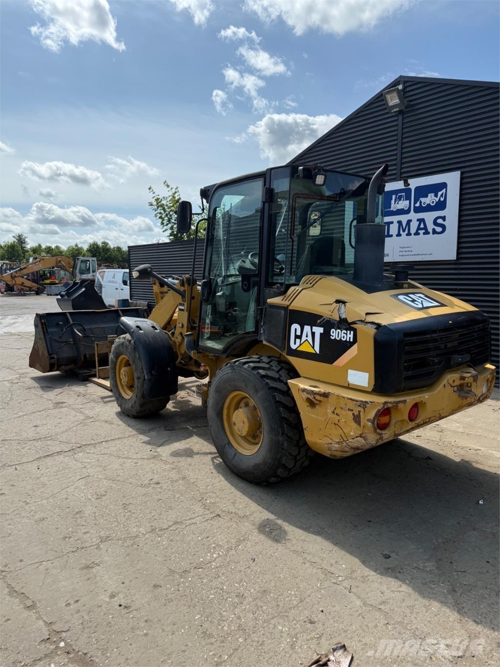 CAT 906H Фронтальные погрузчики