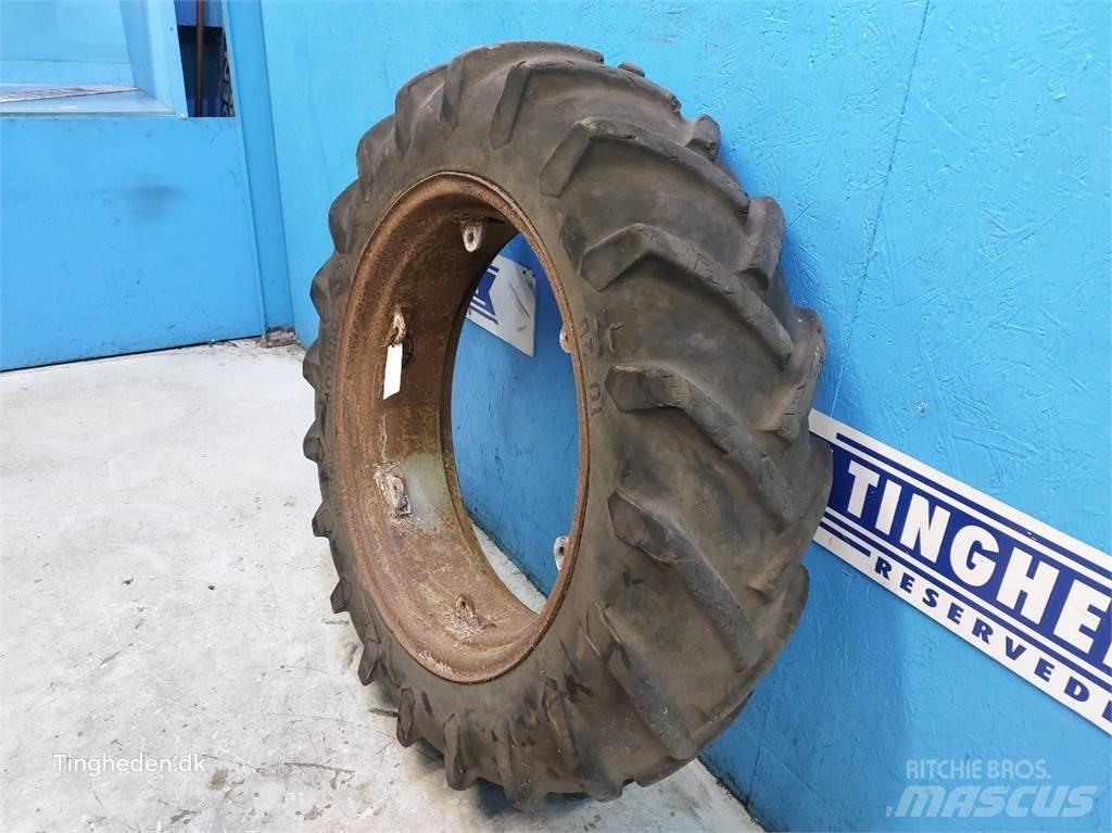 Dunlop 28 10-28 Шины и колёса
