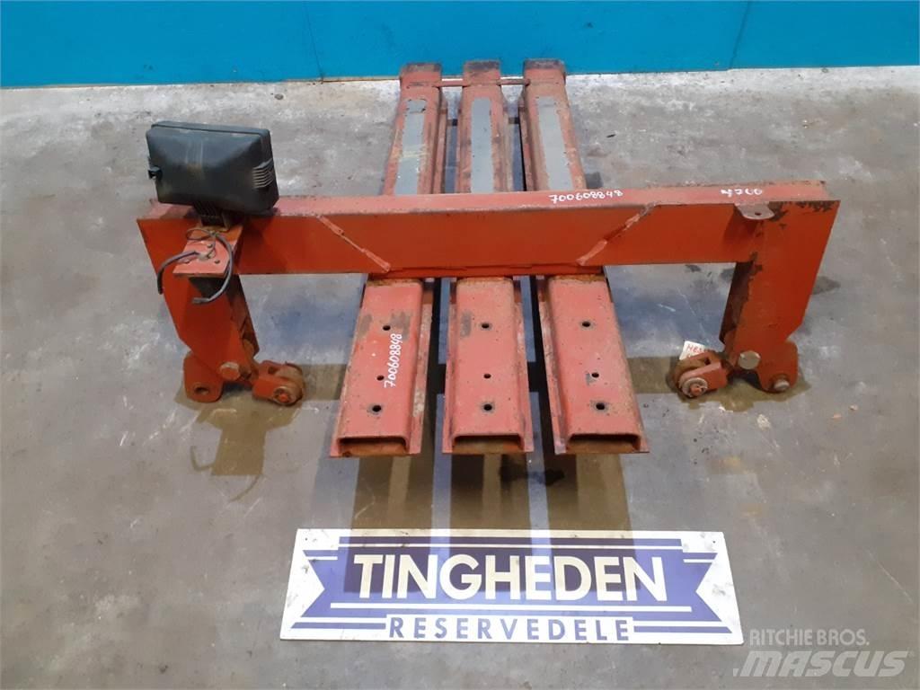 Hesston 4700 Киповые захваты