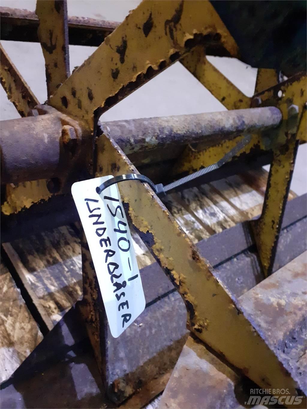 New Holland 1540 Пескоразбрасыватели