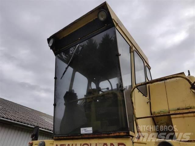 New Holland 1550 Кабины