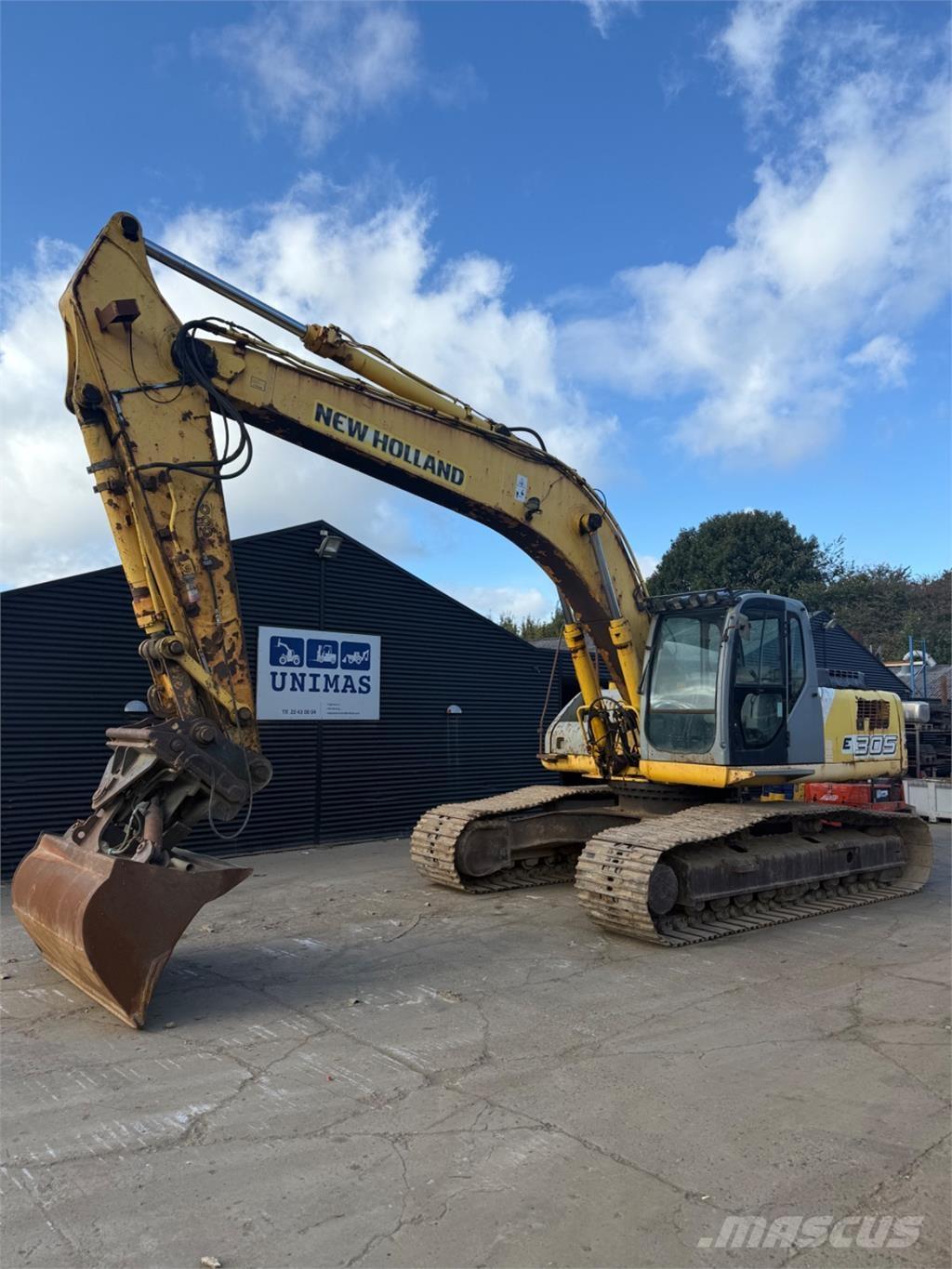 New Holland E305 Гусеничные экскаваторы