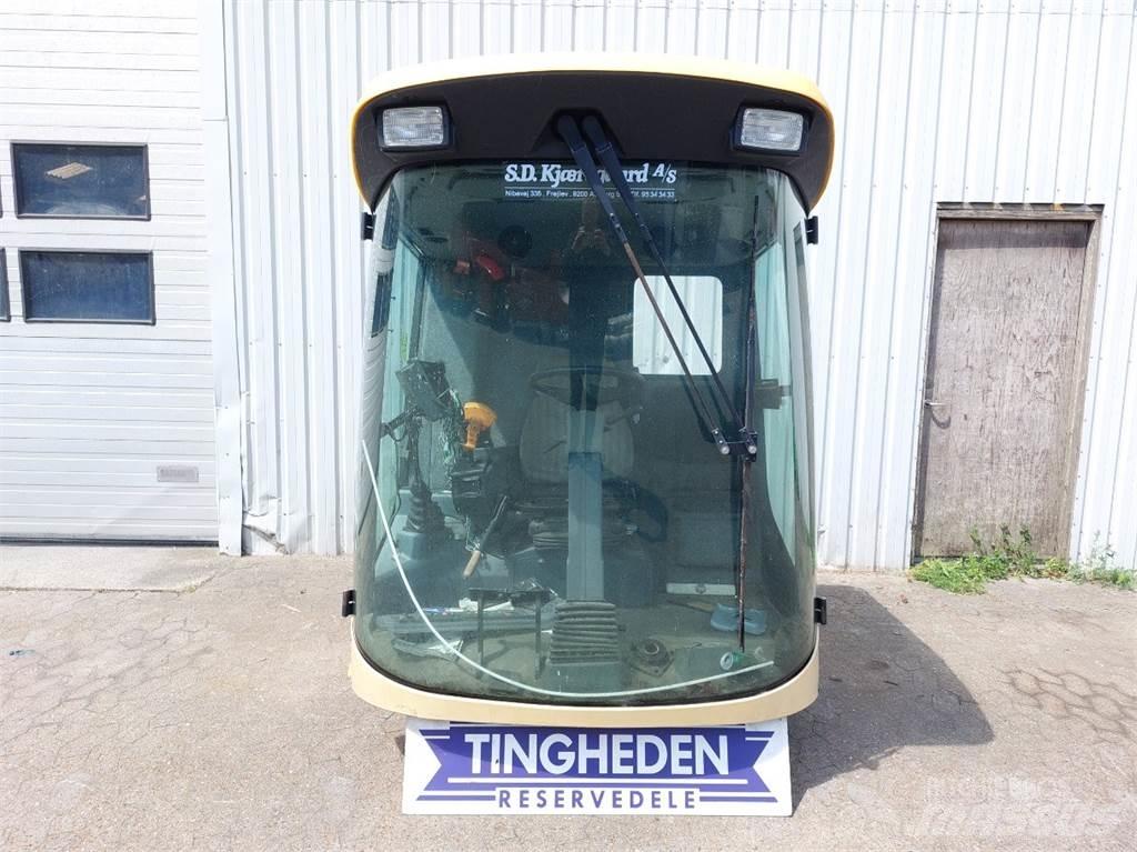 New Holland TX65 Кабины