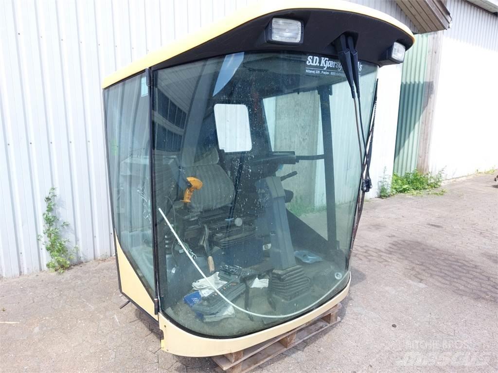 New Holland TX65 Кабины