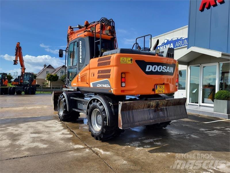 Doosan DX140W-5 Колёсные экскаваторы