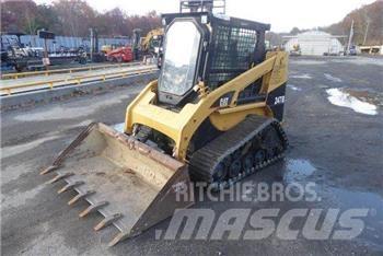 CAT 247B Мини-погрузчики