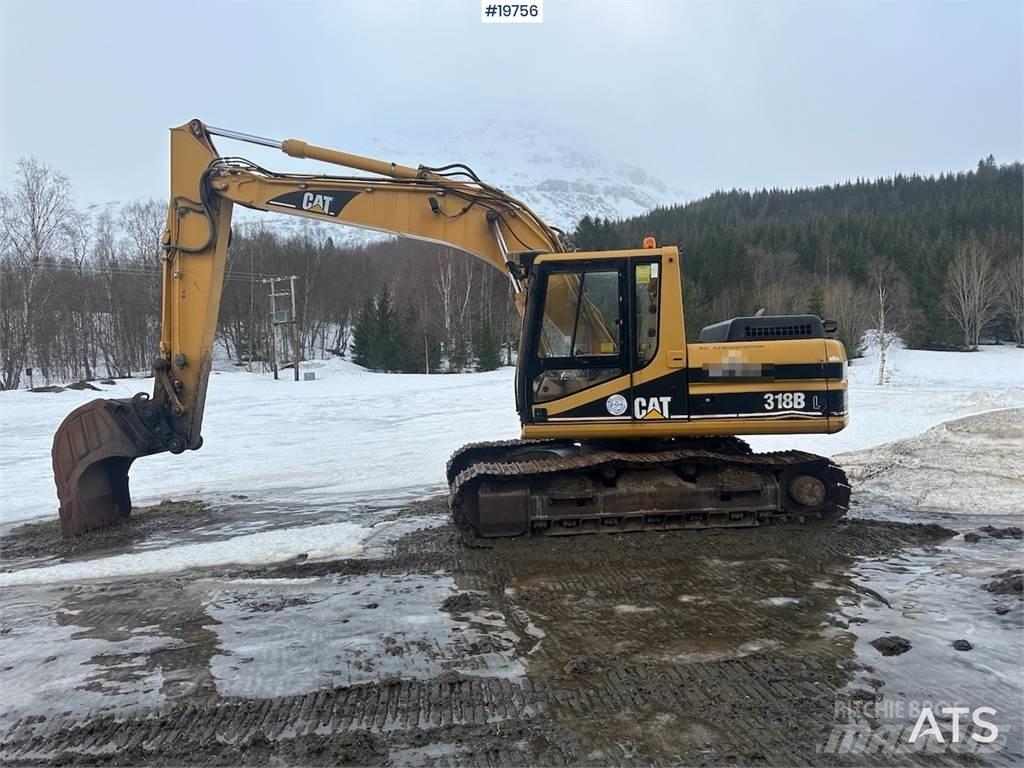 CAT 318BL Гусеничные экскаваторы
