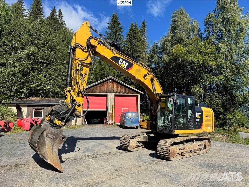 CAT 323FL Гусеничные экскаваторы