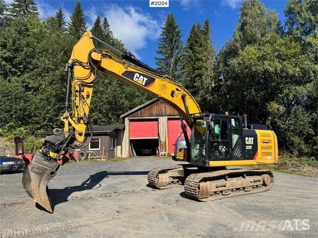 CAT 323FL Гусеничные экскаваторы