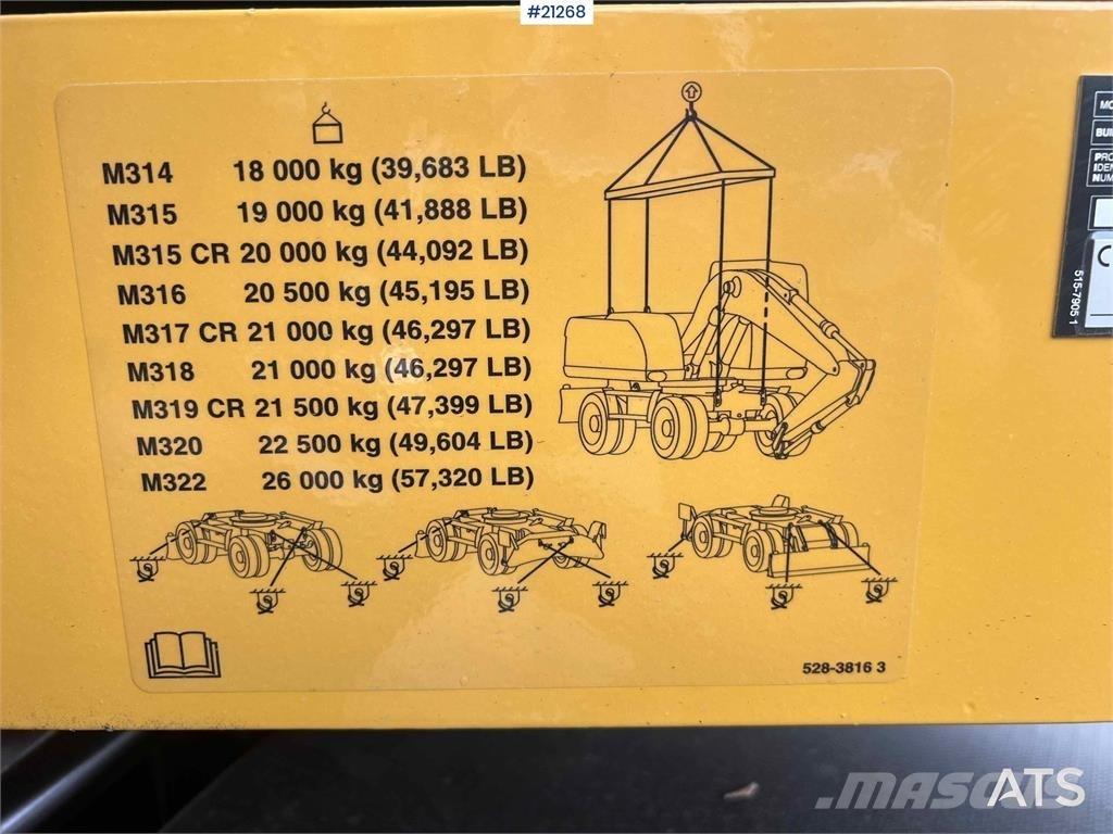 CAT M315 Колёсные экскаваторы