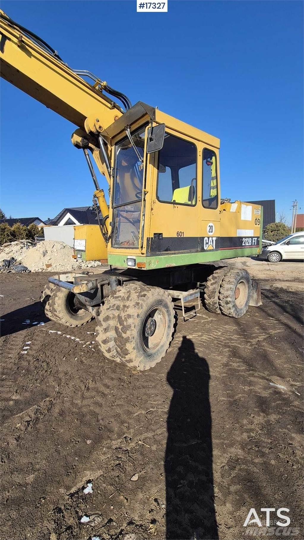 CAT 212BFT Колёсные экскаваторы