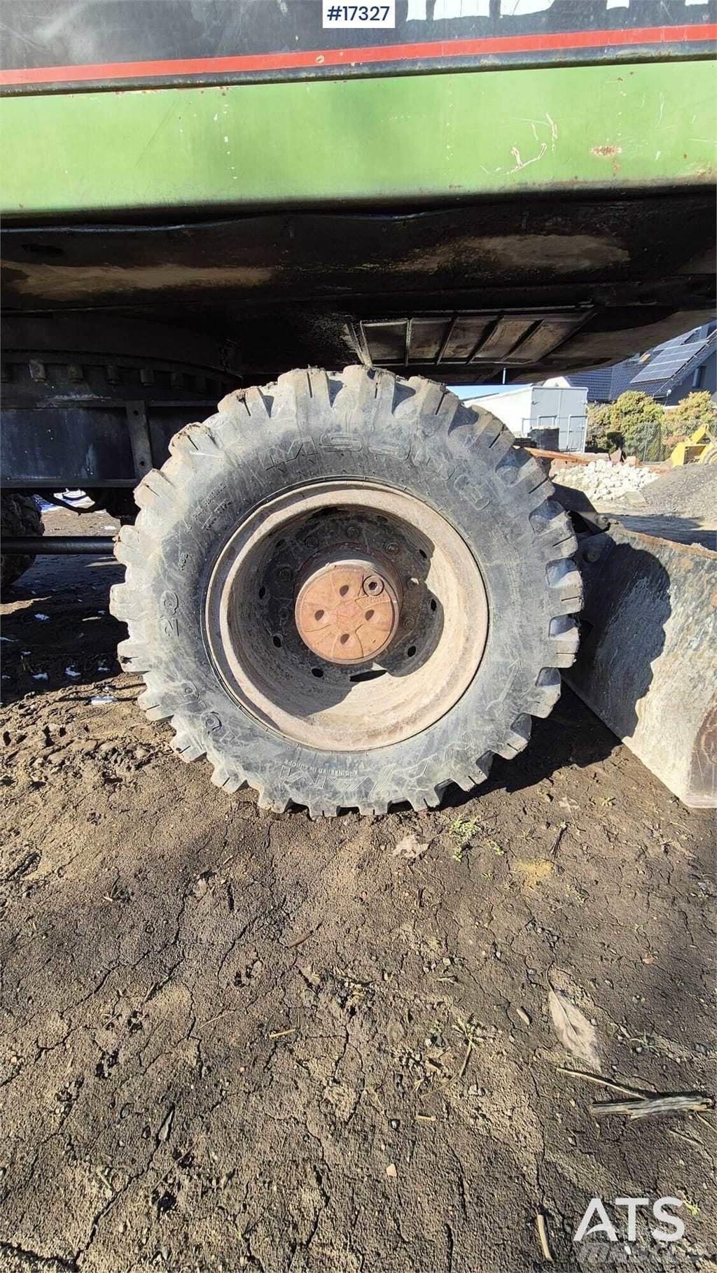 CAT 212BFT Колёсные экскаваторы