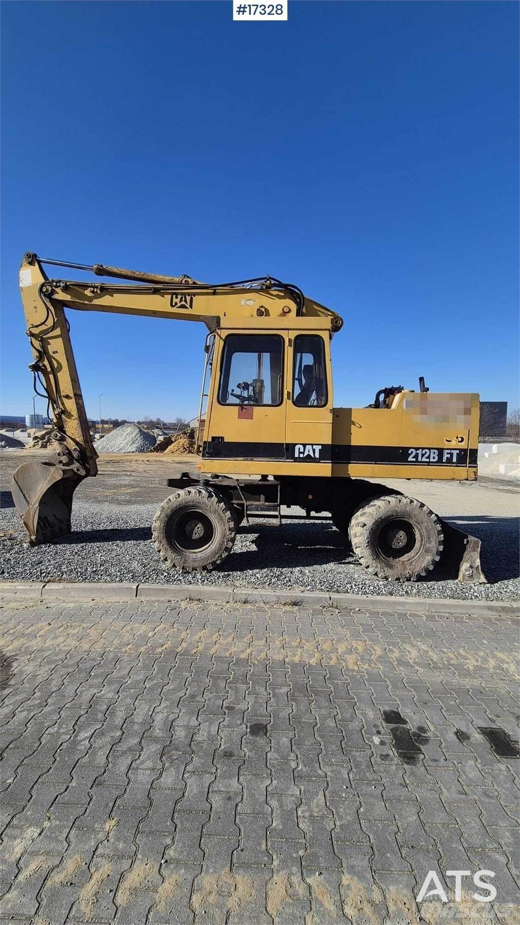 CAT 212BFT Колёсные экскаваторы