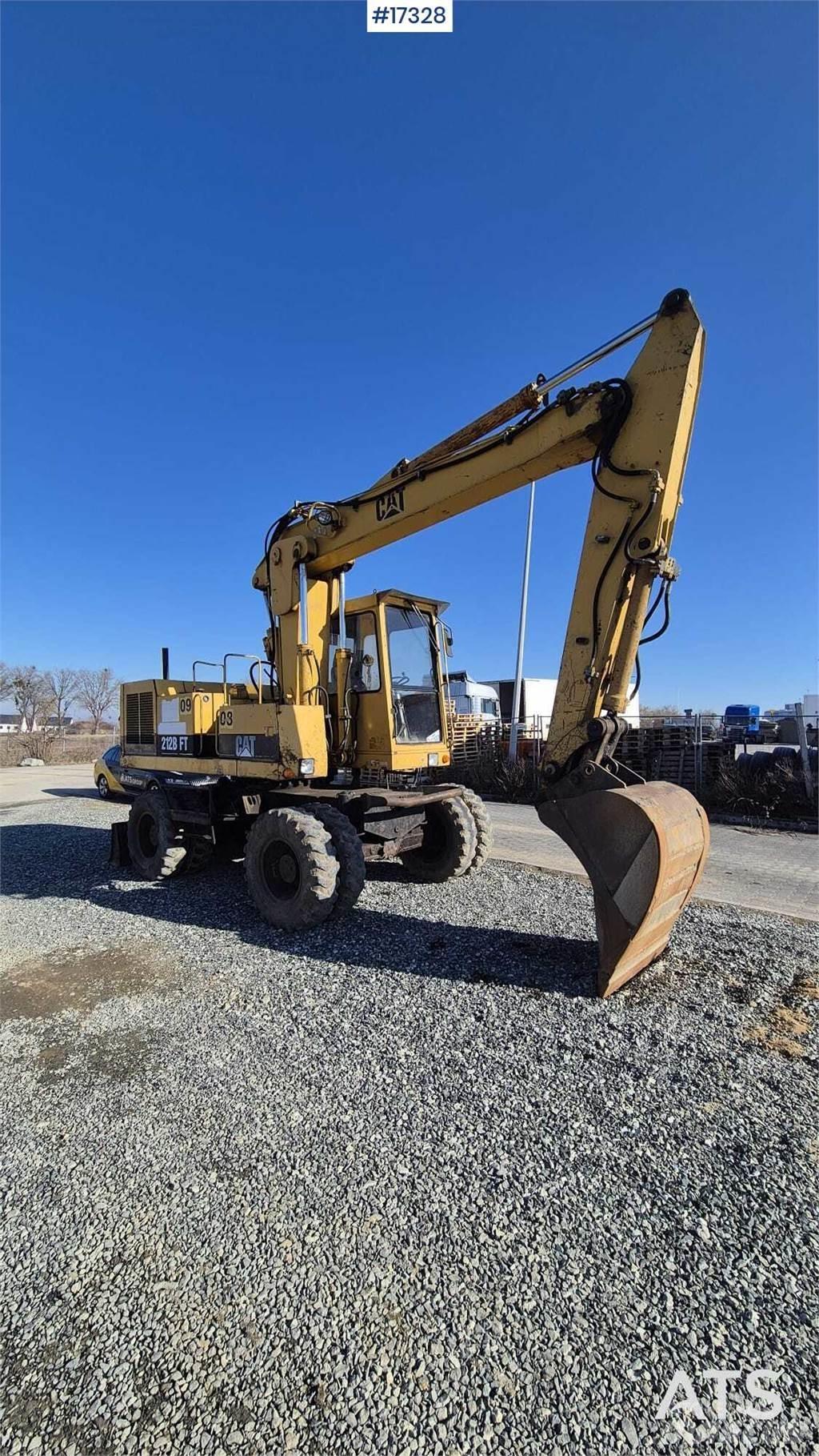 CAT 212BFT Колёсные экскаваторы