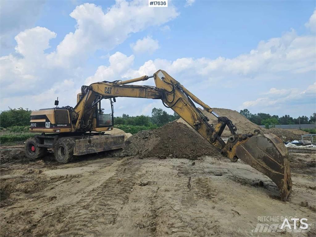 CAT M312 Колёсные экскаваторы