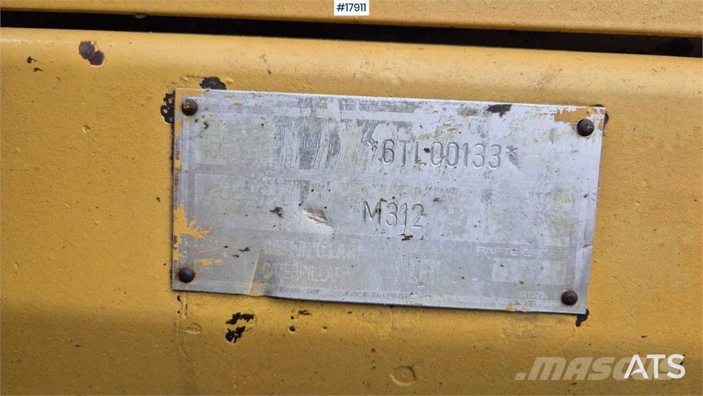 CAT M312 Колёсные экскаваторы
