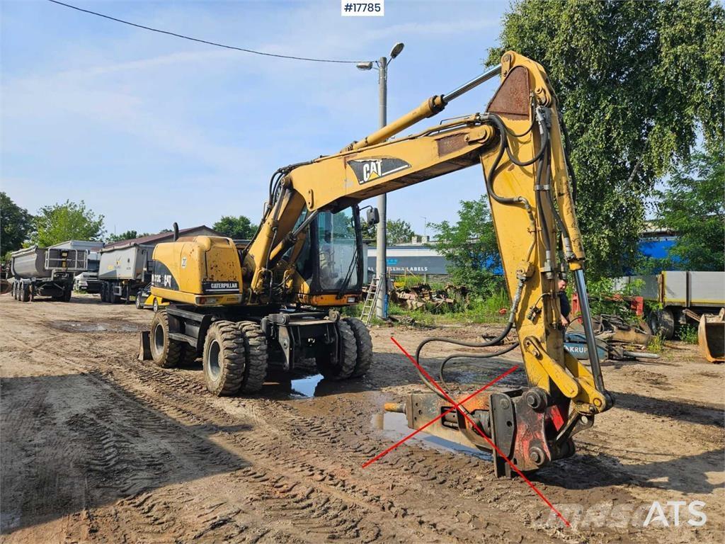 CAT M313 C Колёсные экскаваторы