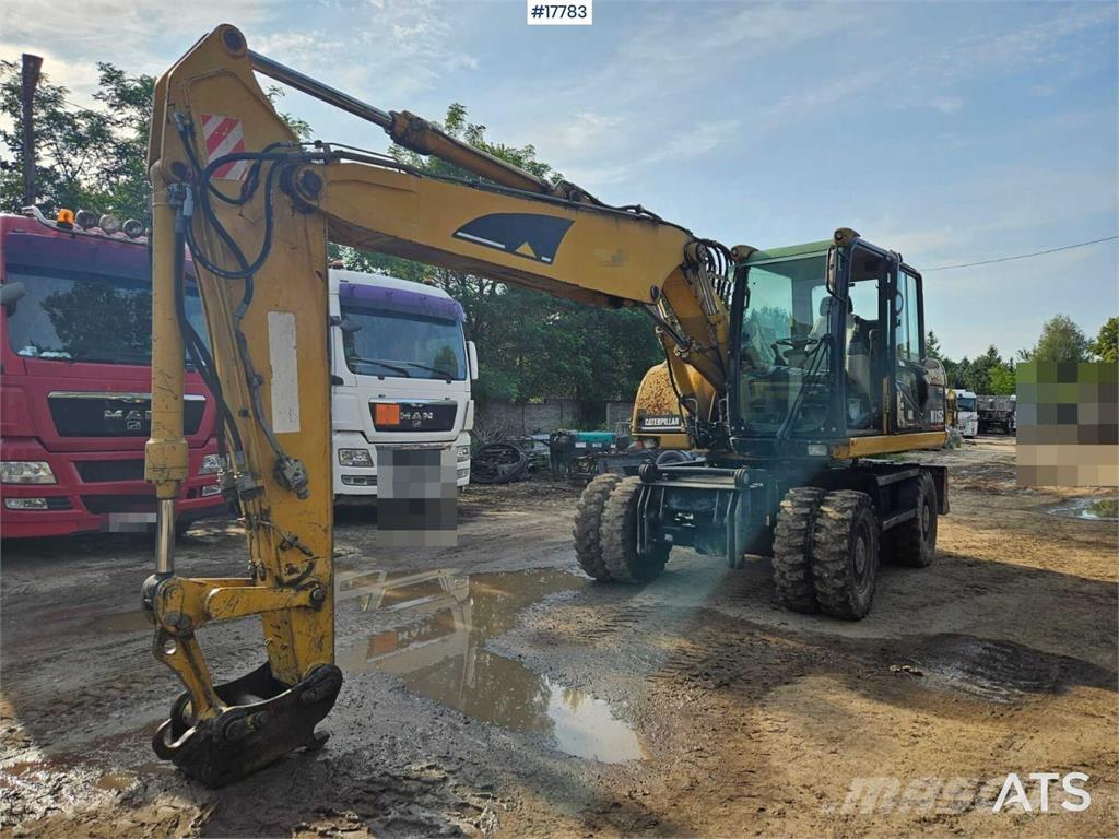 CAT M315C Колёсные экскаваторы