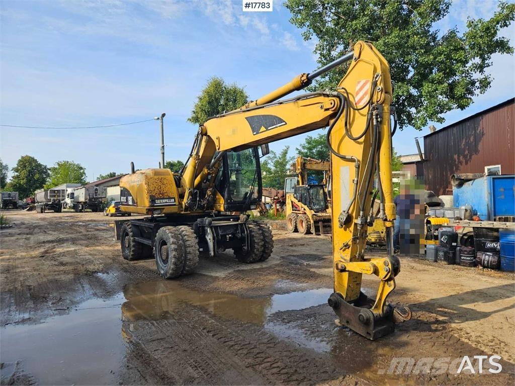 CAT M315C Колёсные экскаваторы