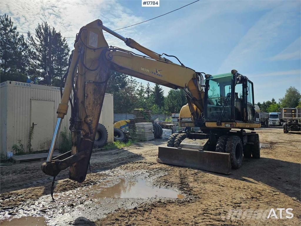 CAT M316C Колёсные экскаваторы