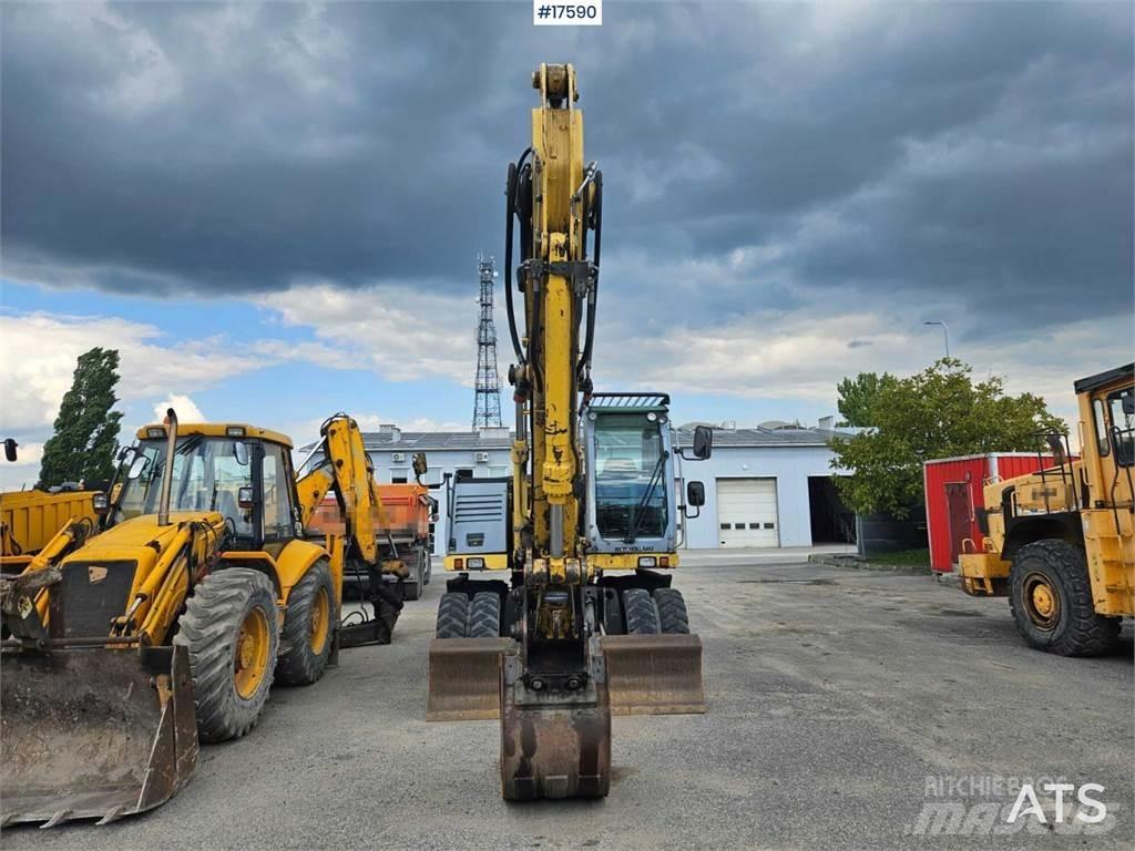New Holland WL 170C Колёсные экскаваторы