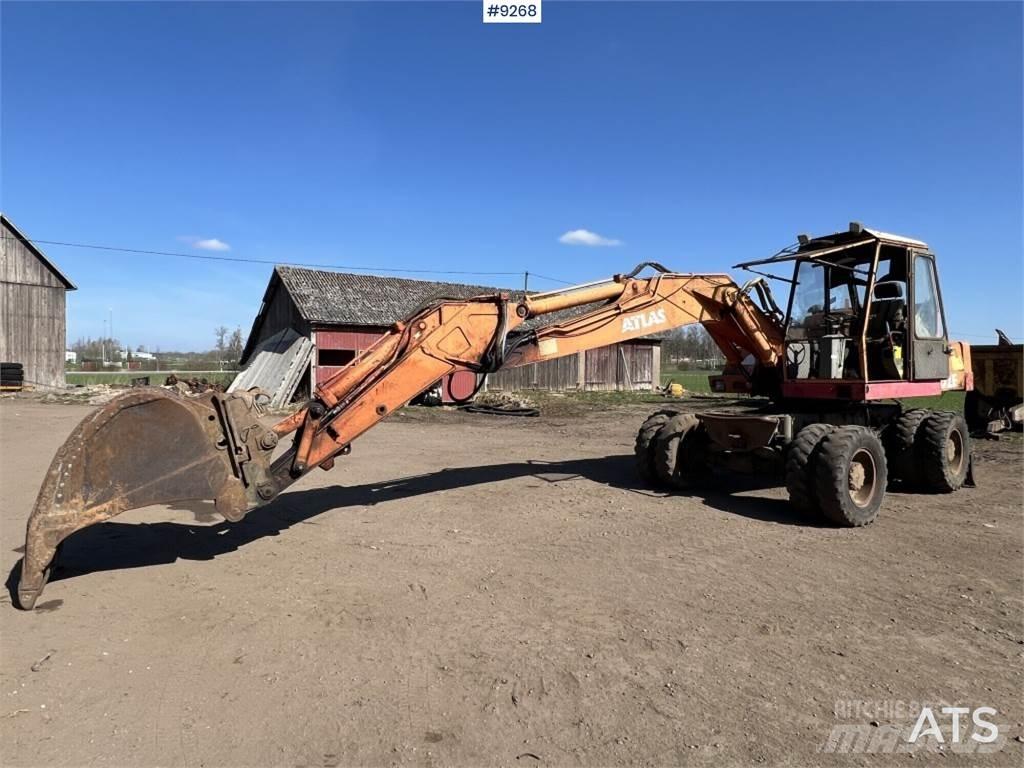 Atlas 1302E Колёсные экскаваторы
