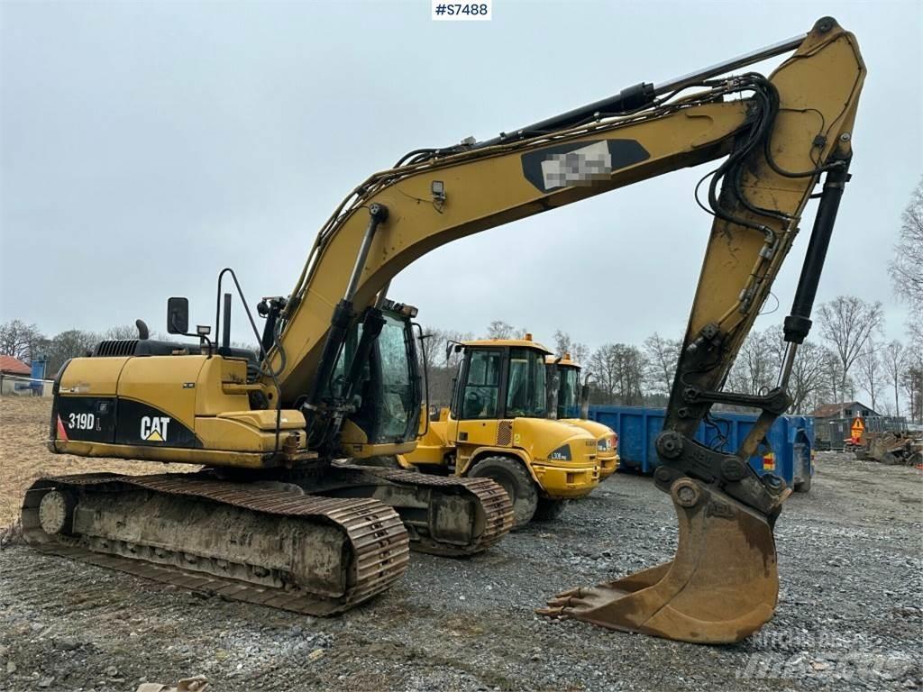 CAT 319D Гусеничные экскаваторы