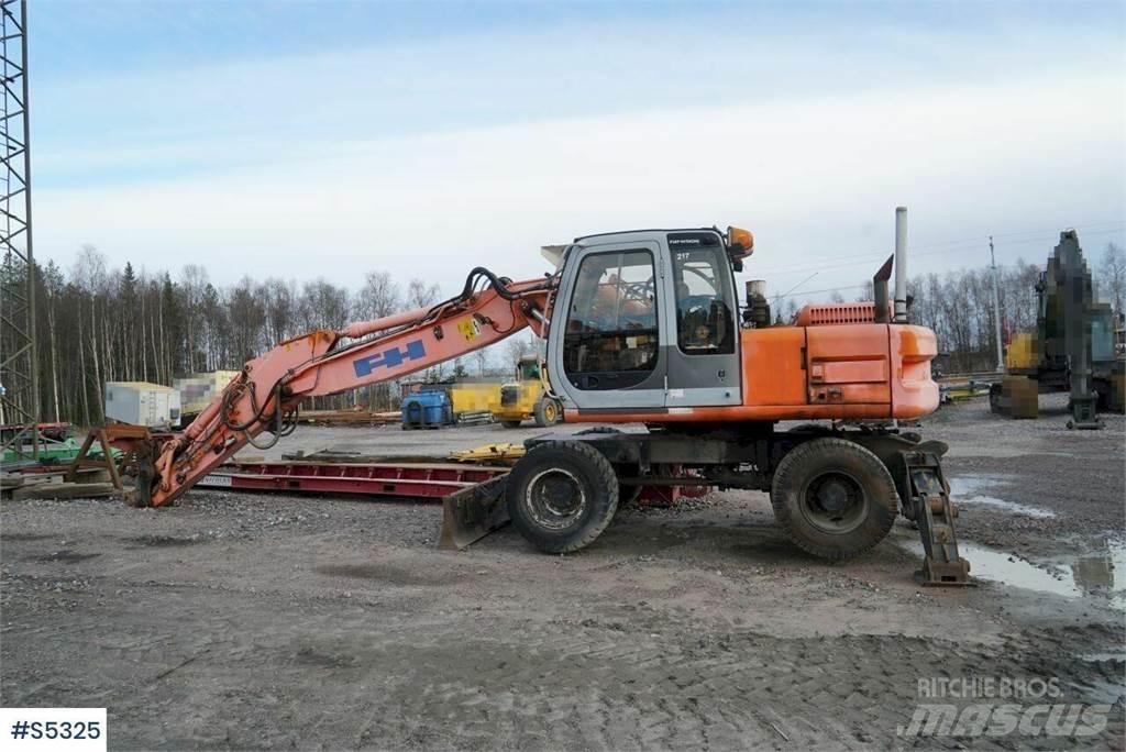 Hitachi EX165W Колёсные экскаваторы