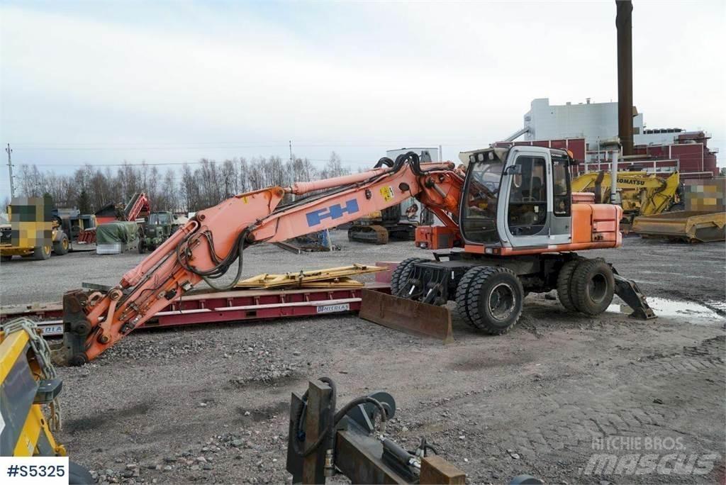 Hitachi EX165W Колёсные экскаваторы
