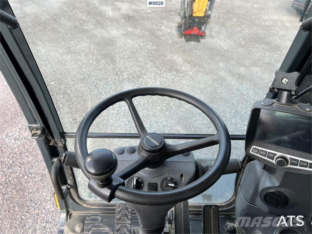 Hyundai 140W-9A Колёсные экскаваторы