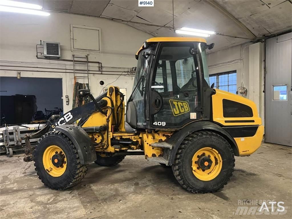 JCB 409 T4 Колесные бульдозеры