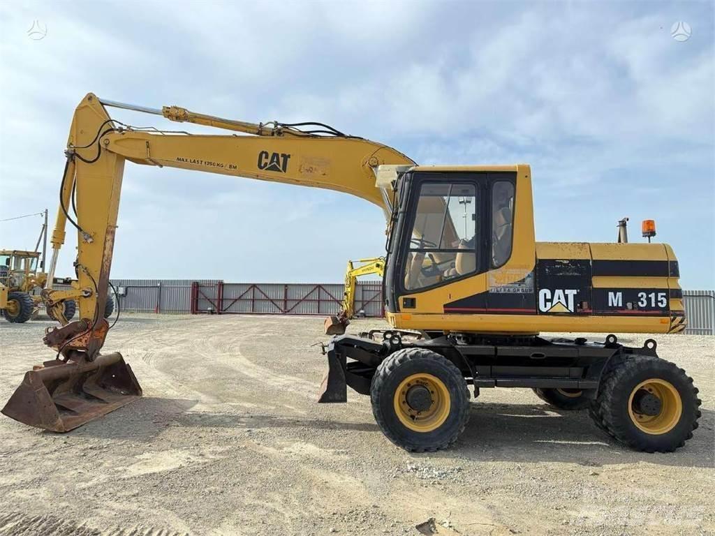 CAT M 315 Колёсные экскаваторы
