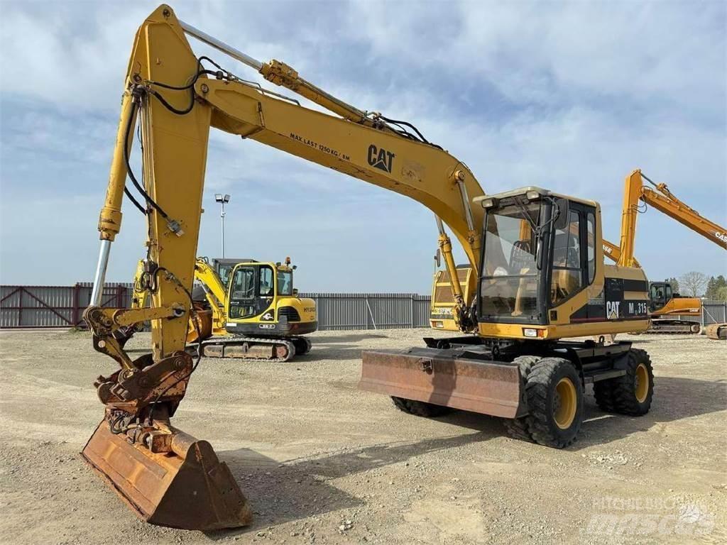 CAT M 315 Колёсные экскаваторы