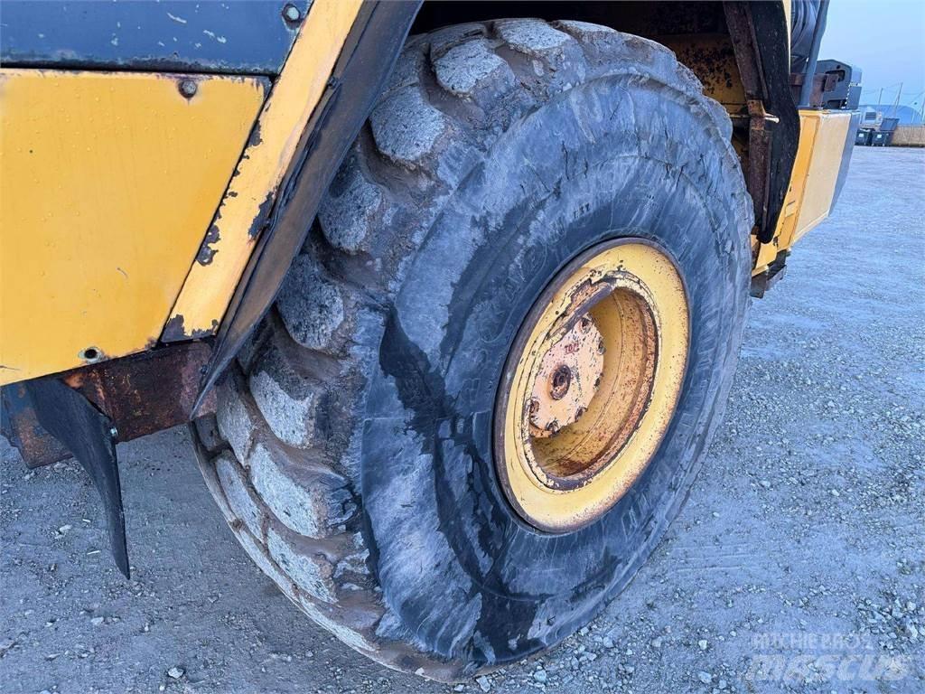 Komatsu HM 400-2 Шарнирно-сочленённые самосвалы
