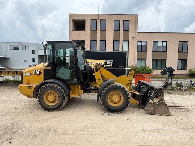 CAT 906 Фронтальные погрузчики