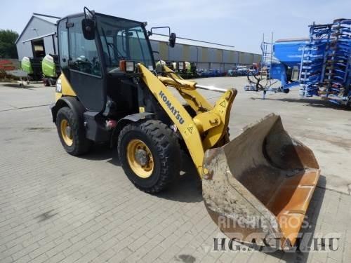 Komatsu 65 Фронтальные погрузчики