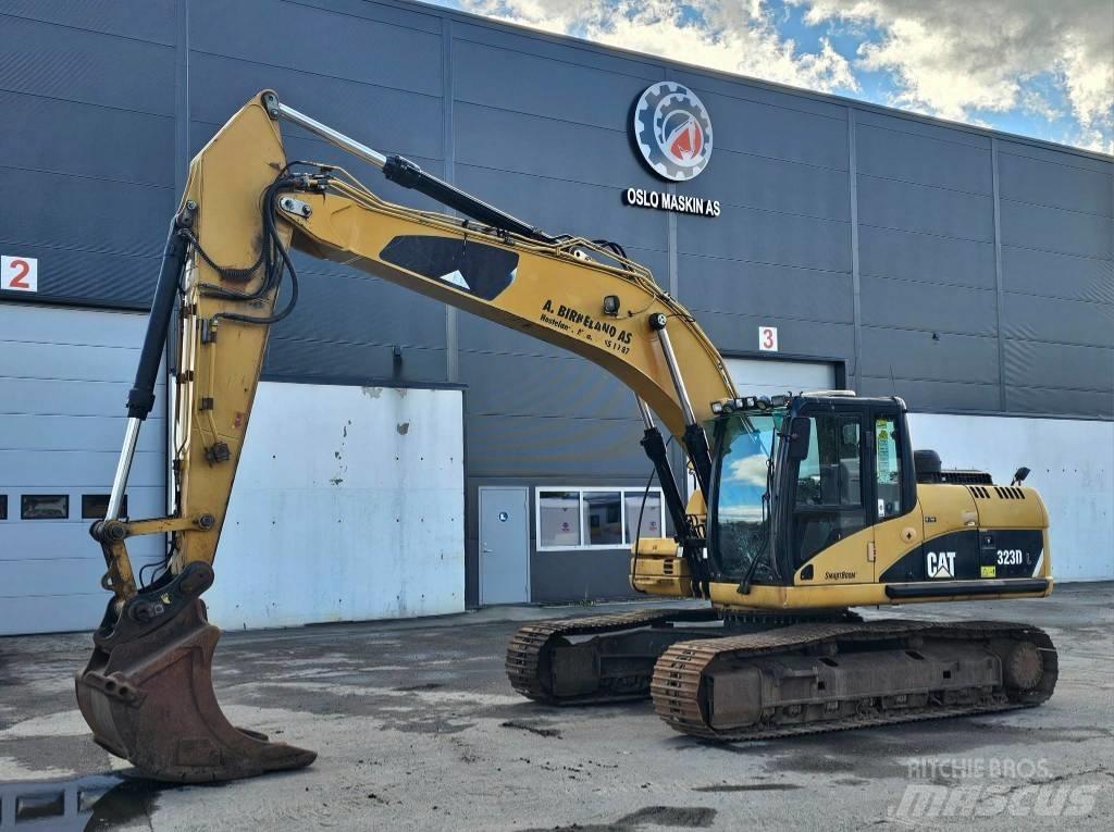 CAT 323 D L Гусеничные экскаваторы